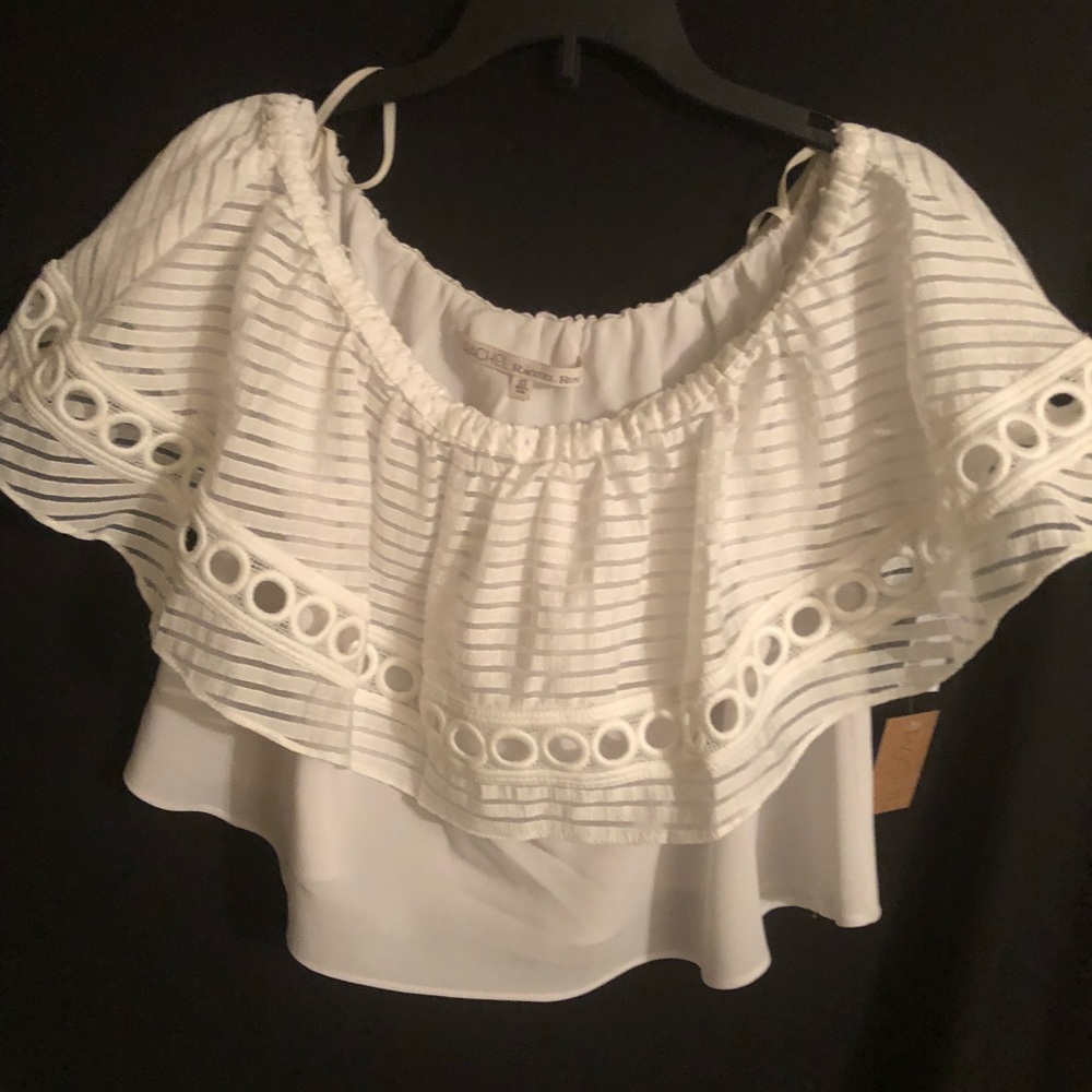 An off white off the shoulder crop dresses blouse